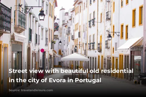 Street view with beautiful old residential buildings in the city of Evora in Portugal 