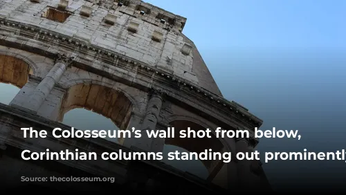 The Colosseum’s wall shot from below, with Corinthian columns standing out prominently