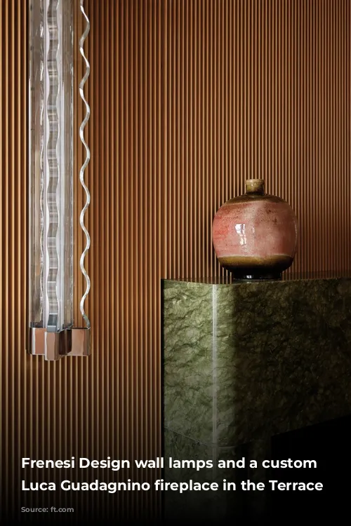 Frenesi Design wall lamps and a custom Studio Luca Guadagnino fireplace in the Terrace Suite