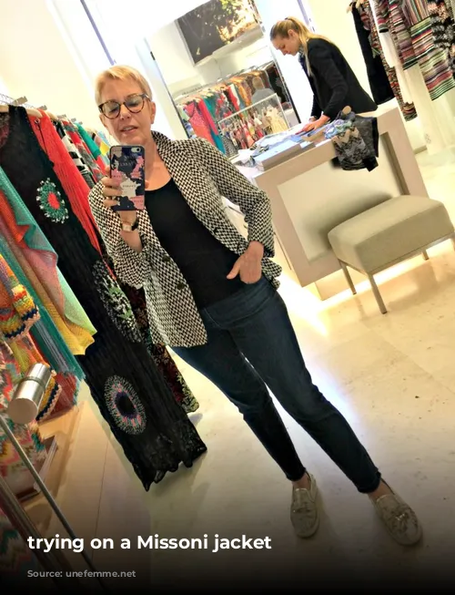 trying on a Missoni jacket