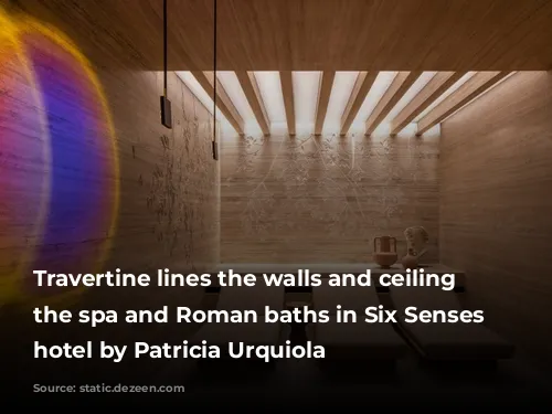 Travertine lines the walls and ceiling inside the spa and Roman baths in Six Senses Rome hotel by Patricia Urquiola