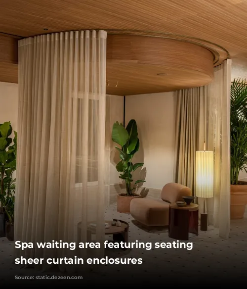 Spa waiting area featuring seating within sheer curtain enclosures