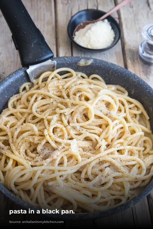 pasta in a black pan.