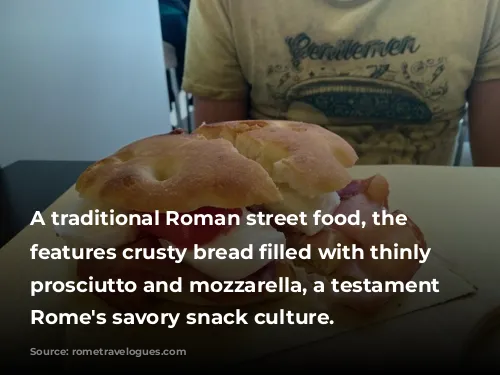 A traditional Roman street food, the sandwich features crusty bread filled with thinly sliced prosciutto and mozzarella, a testament to Rome's savory snack culture.