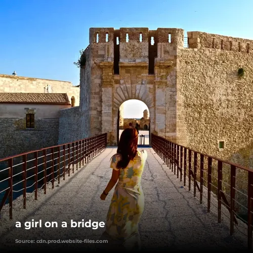 a girl on a bridge