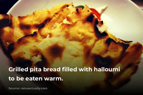 Grilled pita bread filled with halloumi cheese to be eaten warm.