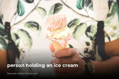 person holding an ice cream