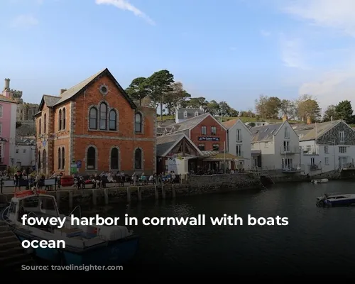 fowey harbor in cornwall with boats and ocean