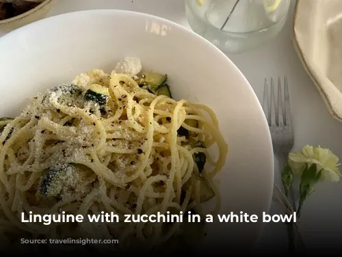 Linguine with zucchini in a white bowl