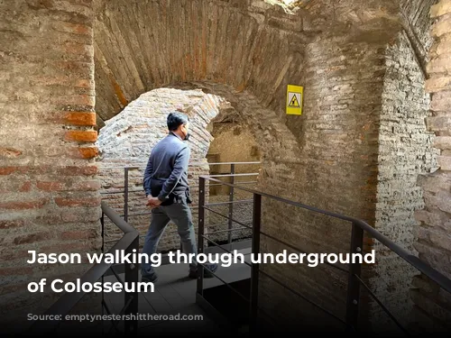 Jason walking through underground tunnels of Colosseum