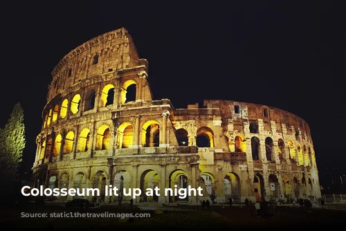 Colosseum lit up at night