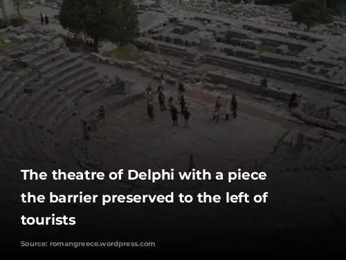 The theatre of Delphi with a piece of the barrier preserved to the left of the tourists